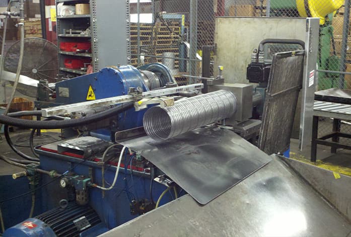 Spiral lockseam perforated corrugated